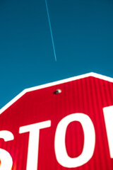 Stop sign and airplane. Abstract, minimalistic 
