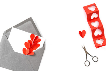 Red paper hearts Valentines Day card white background
