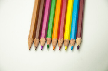 colored pencils on a white background. education concept. illustration of training.

