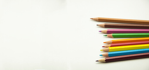Fototapeta premium colored pencils on a white background. education concept. illustration of training.