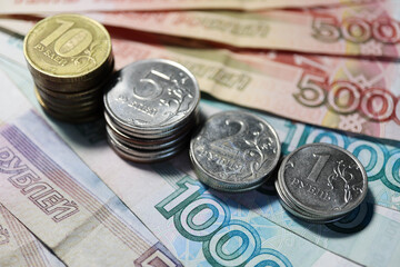 russian roubles banknotes and coins background close up