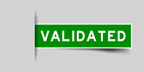 Label sticker green color in word validated that inserted in gray background