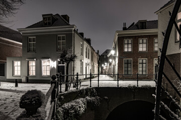 Snowfall at night in old citycenter of 's-Hertogenbosch in the
Netherlands.