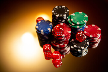 Casino. Poker. Game pieces and dice are on the table. Game chips for betting in gambling. Dice....