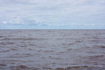 dark sea water in cloudy weather