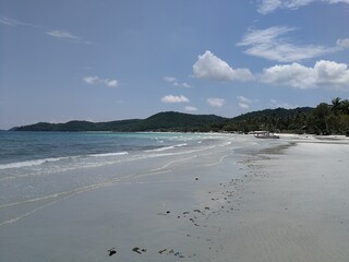 Phu Qoc island beach with white sand and palms in Vietnam