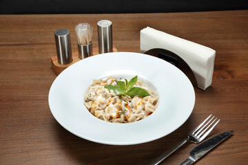 Manti turkish ravioli with minced meat and onion yoghurt sauce butter