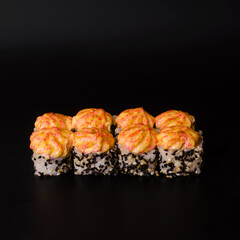baked roll on black background