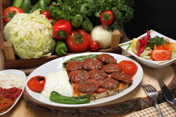 grilled meatballs with sauce yoghurt tomato pepper