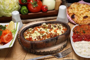chopped meat, tomatoes and pepper in tile