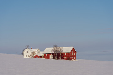 Winter farm in the snow.