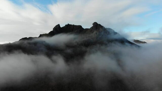 Aerial footage capturing one of Scotland's most iconic mountain summits the Cobbler. Situated in Argyll & Bute in the Scottish Highlands this footage captures it's summit peaking above the clouds.