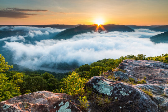 Dramatic spring landscapes in New River Gorge National Park in West Virginia,USA. Clouds  covering the gorge during sunrise  in the Grandview overlook .it is the newest national park in the US.
