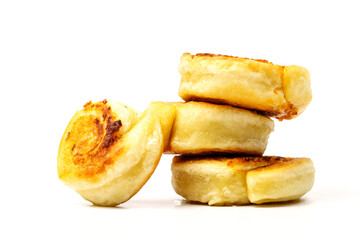 Close-up of fried potato rolls isolated on white