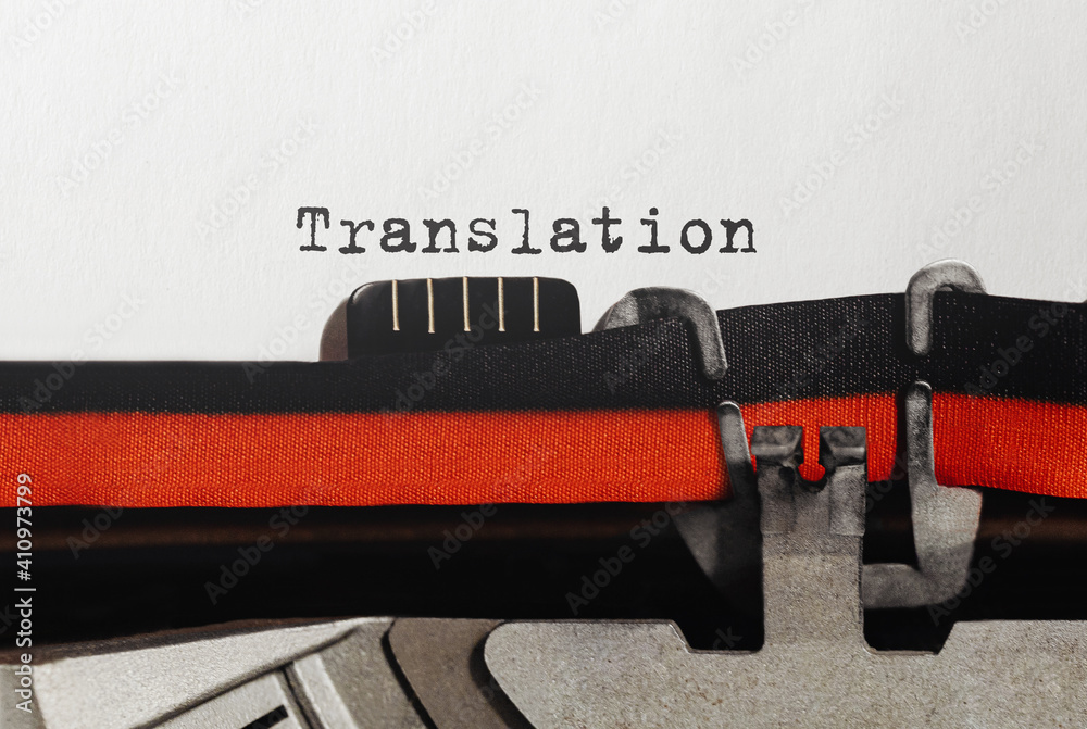 Poster text translation typed on retro typewriter