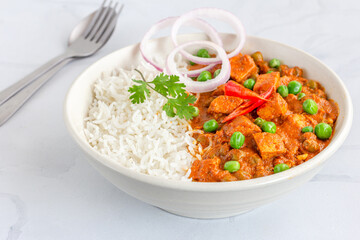 Indian Cottage Cheese and Green Peas Curry Served with Rice Close Up Photo