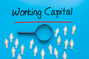 Working Capital Sign on white paper. Man Hand Holding Paper with text. Isolated on Workers concept,...