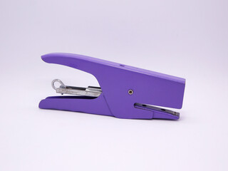 
Stapler for sheets of paper. Office tool. Tool for office workers and schools. Useful metal accessory. Isolated white.