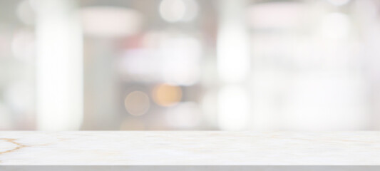 marble table top with blurred abstract cafe restaurant interior background