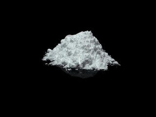 Cocaine drug powder on black background