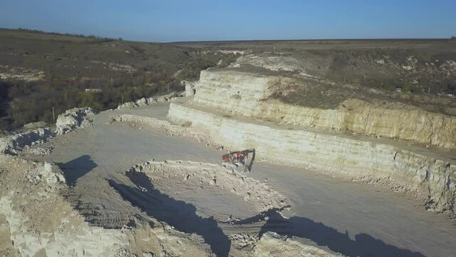 Stone quarry. Aerial view of industrial background with mineral mining quarry. Stock footage.