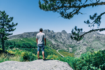 Man looking at landscape mountains Serra da Estrela