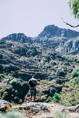 Naklejka premium Man looking at landscape mountains Serra da Estrela