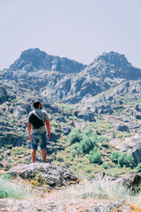 Man looking at landscape mountains Serra da Estrela