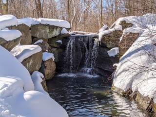 Waterfall in a snowy Central Park NYC