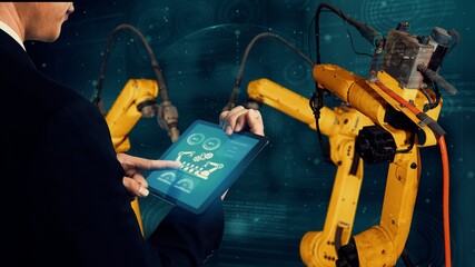 Smart industry robot arms modernization for digital factory technology . Concept of automation...