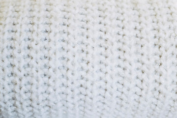 Gros plan sur des mailles tricotées en laine beige - Arrière plan texture laineuse douce