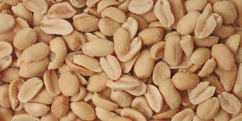 Salted peanuts. Panoramic background.