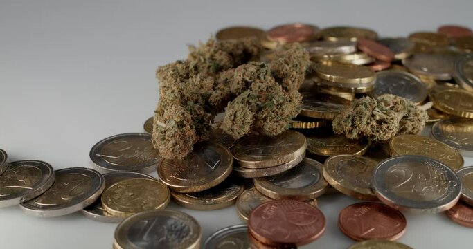 Euro Coins, European Currency with Cannabis. Purchasing Weed Drugs with Euros in Europe