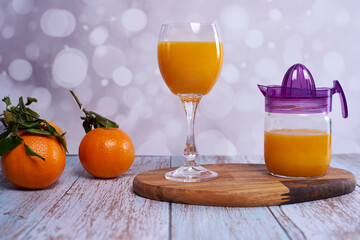 Orange juice with juicer