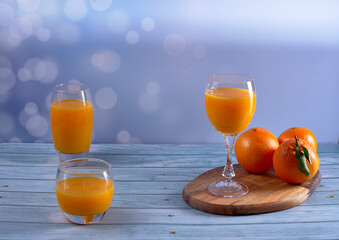 Orange juice in several containers