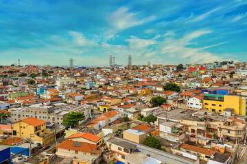 Obraz premium Foto aérea da zona leste de São Paulo, com casas populares