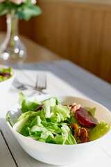 Vegan salad with lettuce, red beet and pecan nuts. Healthy Food. Diet. Healthy lifestyle concept. Cooking At Home