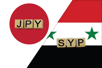 Japan and Syria currencies codes on national flags background