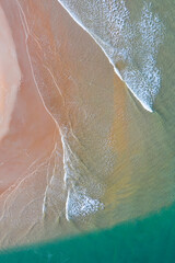 Fototapeta premium Playa de la Rabia and Arroyo del Capitan. Aerial view at low tide. Oyambre Natural Park, San Vicente de la Barquera, Cantabrian Sea, Cantabria, Spain, Europe