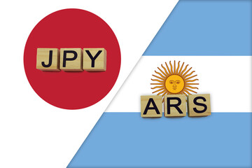 Japan and Argentina currencies codes on national flags background