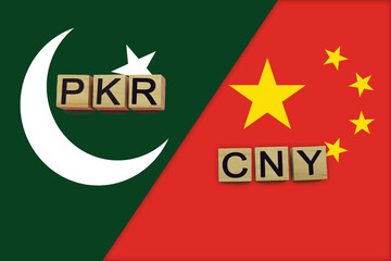 Pakistan and China currencies codes on national flags background