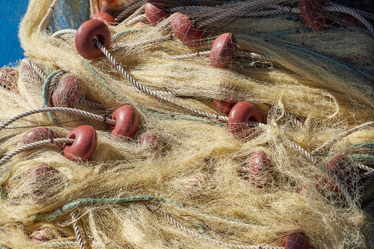 Close-up of a fishing net drying on a fishing boat, Greece