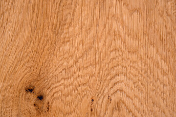 Old brown wood floor texture and background. Empty bright oak wood table surface with knots. Wooden background for serving food close-up.