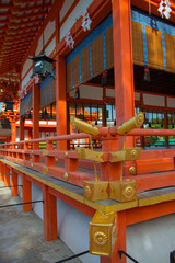 Fototapeta na wymiar Red and golden temple Fushimi Inari shrine, in Japan, near Tokyo
