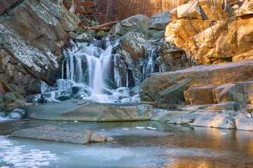 Partially frozen Scott's Run waterfall at sunrise.Scott's Run Nature Preserve.Fairfax County.Virginia.USA