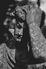Fragment of an ancient statue:angel as symbol of pain, death and end of life.