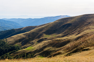 Fototapeta premium Carpathians on the territory of Ukraine. Spring, summer and autumn in the mountains. Mountain ranges and peaks. Sky and clouds. Ruins and rocks. Dragobrat and Svydovets.