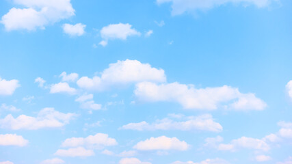 Light blue spring sky with white clouds