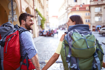 Fototapeta premium Happy tourist couple sightseeing; Traveller lifestyle