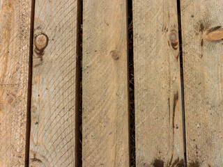 Wooden planed boards, in the form of flooring for the floor on earthen and similar surfaces.